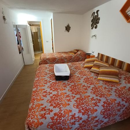 Portopollo Surfhouse Barrabisa Eksteriør billede