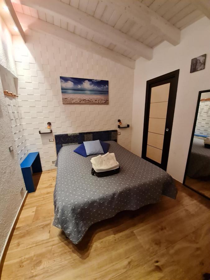 Portopollo Surfhouse Barrabisa Eksteriør billede