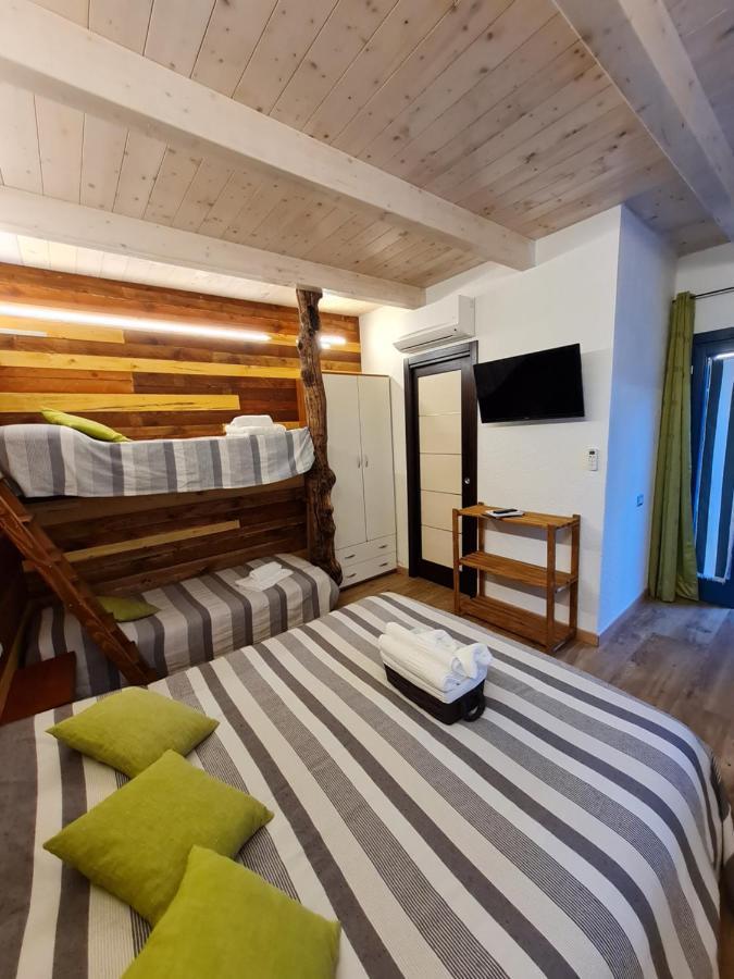 Portopollo Surfhouse Barrabisa Eksteriør billede